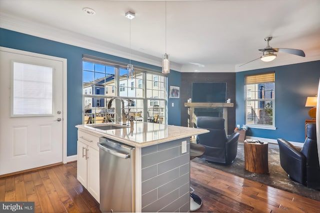 801 Skippers Ln, Annapolis, MD 21401 - kitchen with stainless steel dishwasher, a sink, dark wood finished floors, open floor plan, and white cabinetry