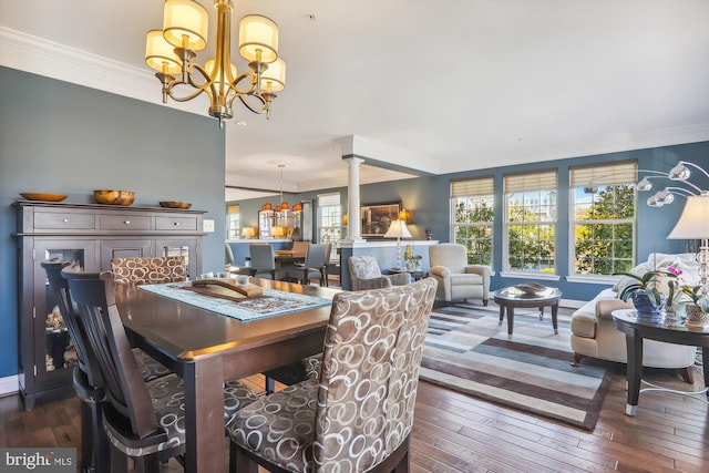 801 Skippers Ln, Annapolis, MD 21401 - dining area with a chandelier, ornamental molding, hardwood / wood-style floors, ornate columns, and baseboards