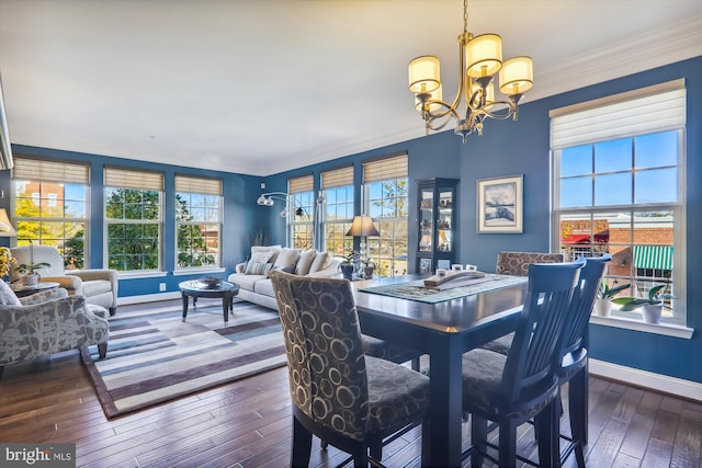 801 Skippers Ln, Annapolis, MD 21401 - dining space featuring a chandelier, baseboards, hardwood / wood-style flooring, and ornamental molding