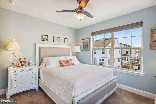 801 Skippers Ln, Annapolis, MD 21401 - bedroom with dark carpet, baseboards, and ceiling fan