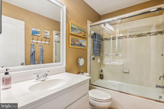 801 Skippers Ln, Annapolis, MD 21401 - bathroom featuring vanity, toilet, and combined bath / shower with glass door
