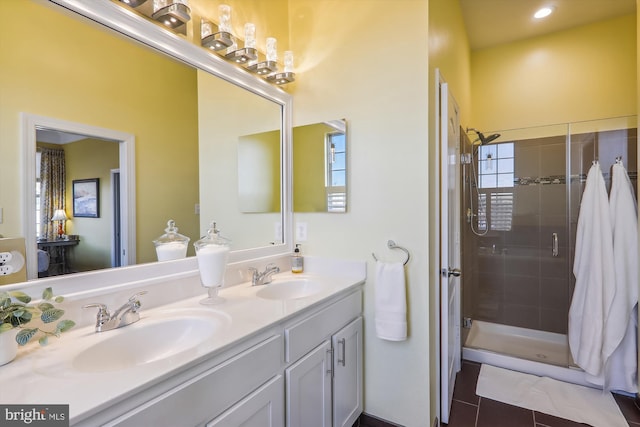 801 Skippers Ln, Annapolis, MD 21401 - bathroom featuring a stall shower, double vanity, and tile patterned floors