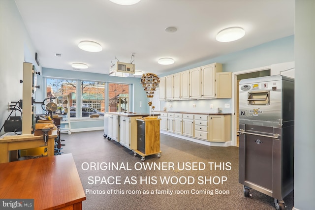 801 Skippers Ln, Annapolis, MD 21401 - kitchen featuring cream cabinets and a center island