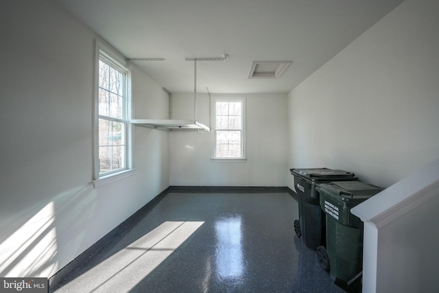 empty room featuring baseboards