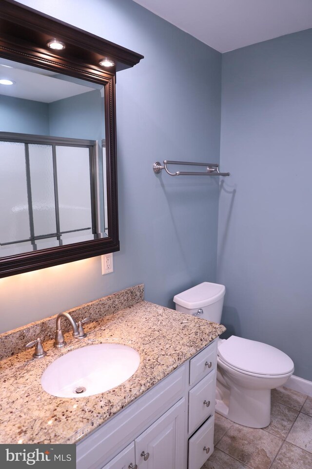 13209 Briarcliff Dr, Hagerstown, MD 21742 - bathroom with vanity, toilet, and baseboards