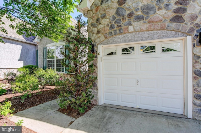 garage with driveway