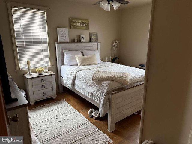 bedroom featuring wood finished floors