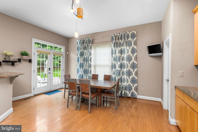 12406 Old Grey Mare Ct, Reisterstown, MD 21136 - dining room with baseboards, light wood-style flooring, and french doors