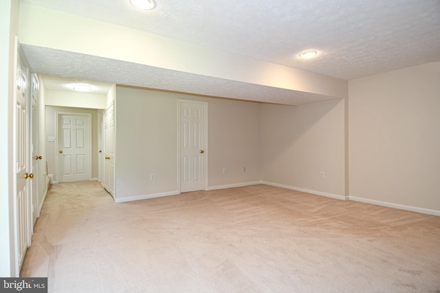 43193 Ribboncrest Ter, Ashburn, VA 20147 - finished below grade area featuring light carpet and a textured ceiling