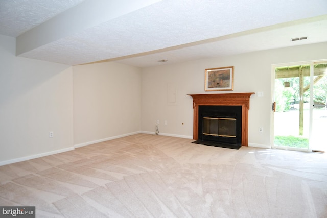 43193 Ribboncrest Ter, Ashburn, VA 20147 - unfurnished living room featuring light carpet, a fireplace with flush hearth, and a textured ceiling