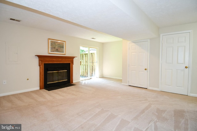 43193 Ribboncrest Ter, Ashburn, VA 20147 - unfurnished living room featuring carpet floors, a fireplace with flush hearth, electric panel, and a textured ceiling