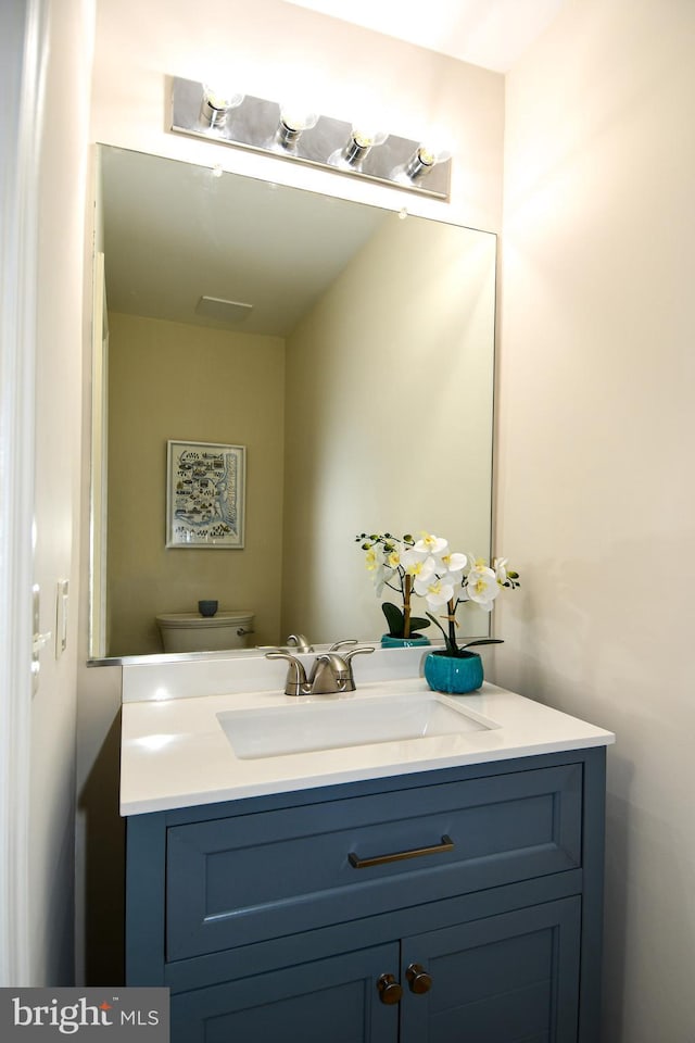 43193 Ribboncrest Ter, Ashburn, VA 20147 - half bathroom with vanity and toilet