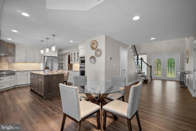 410 Metropolitan Blvd, Pasadena, MD 21122 - dining space with dark wood-type flooring, recessed lighting, baseboards, and stairs