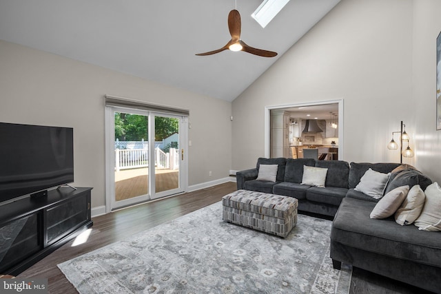 410 Metropolitan Blvd, Pasadena, MD 21122 - living room with high vaulted ceiling, a ceiling fan, baseboards, and wood finished floors