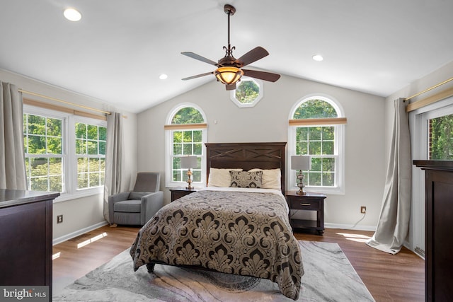 410 Metropolitan Blvd, Pasadena, MD 21122 - bedroom featuring multiple windows, vaulted ceiling, wood finished floors, baseboards, and recessed lighting