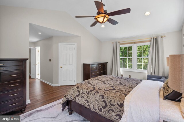 410 Metropolitan Blvd, Pasadena, MD 21122 - bedroom with dark wood-type flooring, vaulted ceiling, baseboards, recessed lighting, and ceiling fan