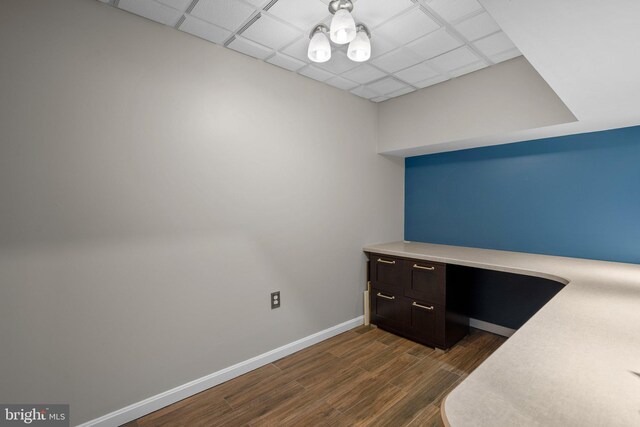 410 Metropolitan Blvd, Pasadena, MD 21122 - unfurnished office with dark wood-type flooring, baseboards, and a drop ceiling