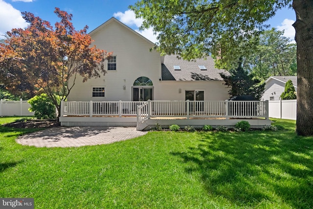 410 Metropolitan Blvd, Pasadena, MD 21122 - back of house with a deck, roof with shingles, and a patio area