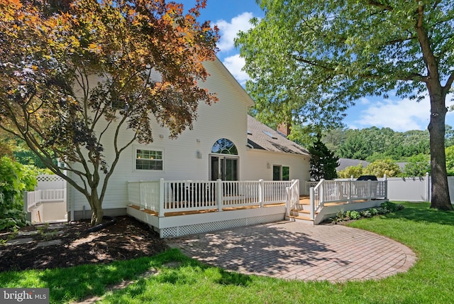 410 Metropolitan Blvd, Pasadena, MD 21122 - back of property with a patio area, a deck, and a chimney