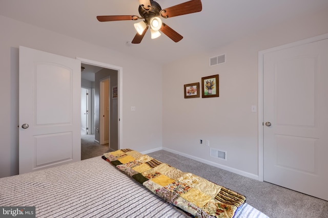 unfurnished bedroom with carpet, baseboards, and a ceiling fan