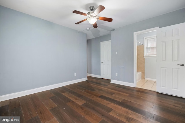 3322 Ely Pl SE, Washington, DC 20019 - unfurnished bedroom with wood-type flooring, baseboards, and ceiling fan