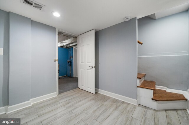 3322 Ely Pl SE, Washington, DC 20019 - finished basement featuring wood tiled floors, baseboards, stairs, and recessed lighting