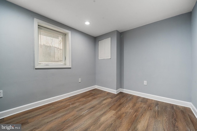 3322 Ely Pl SE, Washington, DC 20019 - unfurnished room featuring dark wood finished floors, baseboards, and recessed lighting
