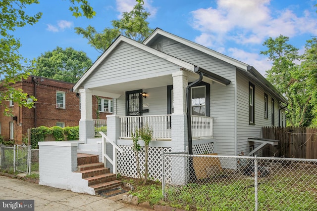 3322 Ely Pl SE, Washington, DC 20019 - view of front of home with covered porch and fence