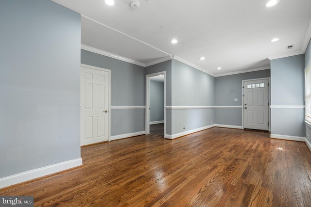 3322 Ely Pl SE, Washington, DC 20019 - unfurnished room with recessed lighting, wood finished floors, a smoke detector, baseboards, and ornamental molding