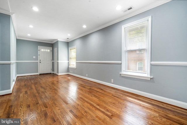 3322 Ely Pl SE, Washington, DC 20019 - spare room with crown molding, baseboards, recessed lighting, and wood finished floors