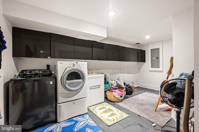 washroom with cabinet space, washer and clothes dryer, electric panel, recessed lighting, and baseboards