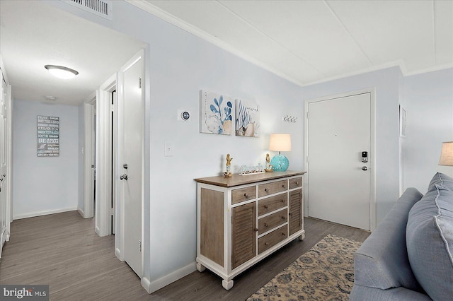 6007 Atlantic Ave Unit 207, Ocean City, MD 21842 - entryway featuring wood finished floors, baseboards, and crown molding