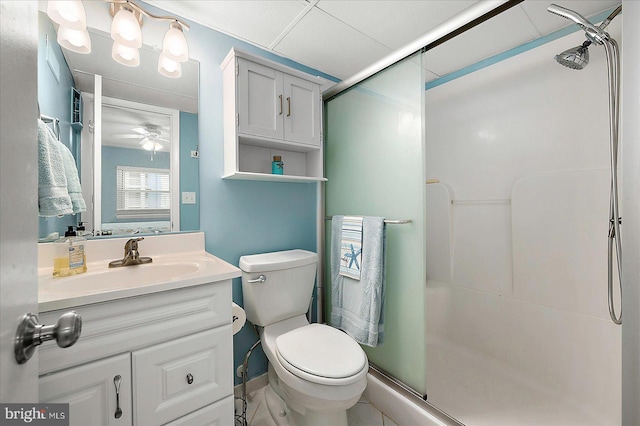 6007 Atlantic Ave Unit 207, Ocean City, MD 21842 - bathroom featuring a shower stall, a ceiling fan, toilet, and vanity