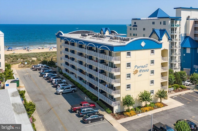 6007 Atlantic Ave Unit 207, Ocean City, MD 21842 - view of apartment building / complex with uncovered parking and a water view