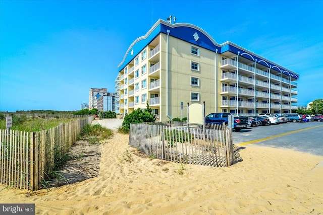 6007 Atlantic Ave Unit 207, Ocean City, MD 21842 - view of building exterior featuring uncovered parking