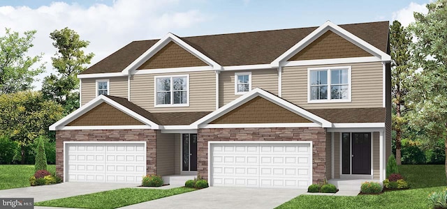 craftsman-style home featuring a garage, stone siding, driveway, and a front lawn