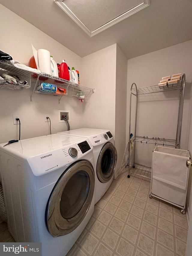 laundry area with washer and dryer