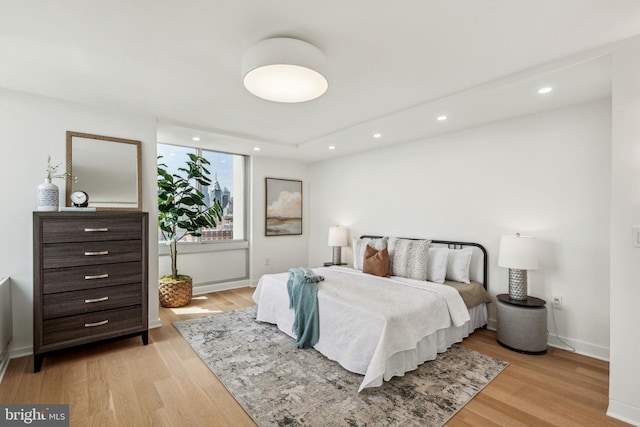604 S Washington Sq Unit 2917, Philadelphia, PA 19106 - bedroom with light wood-type flooring, baseboards, and recessed lighting