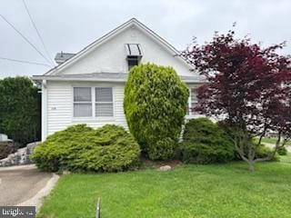 1128 Galbraith Ave, Upper Chichester, PA 19061 - view of side of home with a lawn