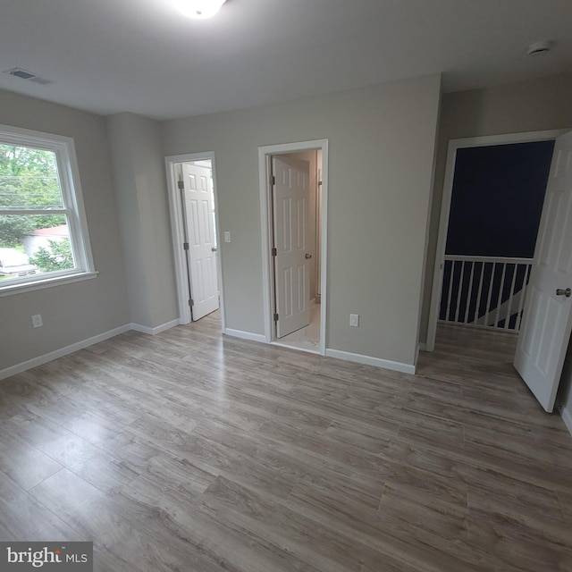 3608 Upshur St, Brentwood, MD 20722 - empty room with wood finished floors, baseboards, and a smoke detector
