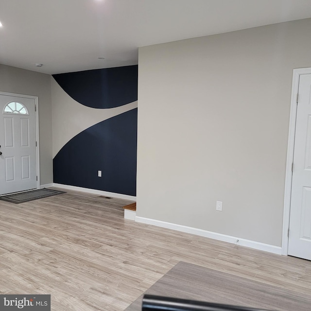 3608 Upshur St, Brentwood, MD 20722 - foyer featuring light wood-type flooring and baseboards