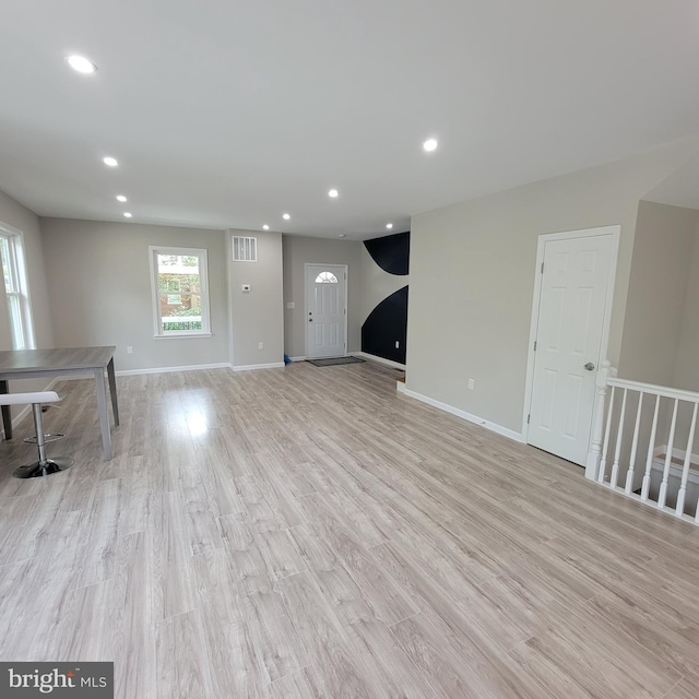 3608 Upshur St, Brentwood, MD 20722 - unfurnished living room with light wood finished floors, recessed lighting, and baseboards