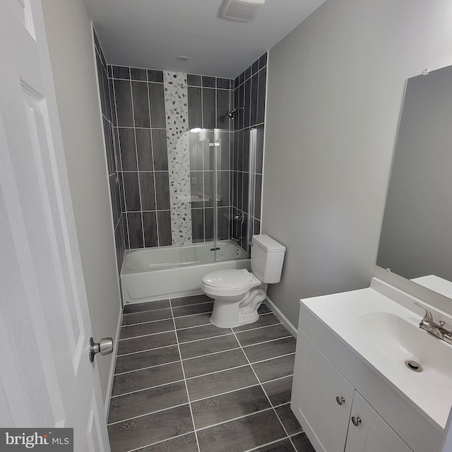 3608 Upshur St, Brentwood, MD 20722 - full bathroom with toilet, vanity, washtub / shower combination, tile patterned floors, and baseboards