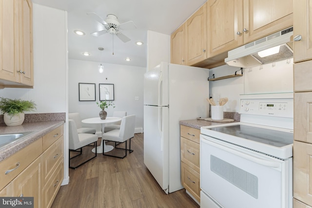 15415 Michigan Rd, Woodbridge, VA 22191 - kitchen with white appliances, under cabinet range hood, light brown cabinetry, wood finished floors, and recessed lighting