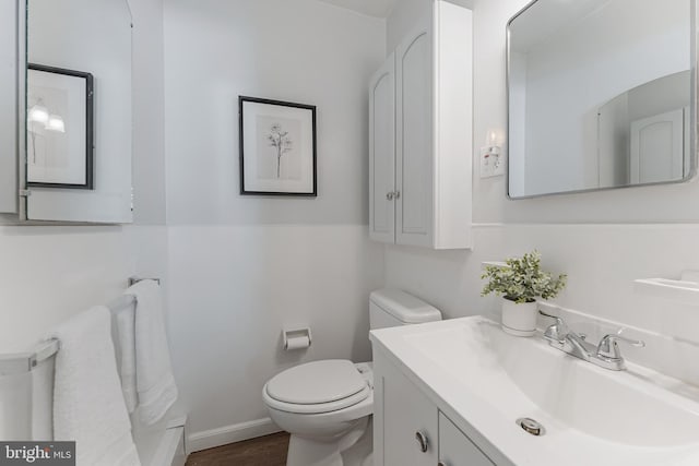 15415 Michigan Rd, Woodbridge, VA 22191 - bathroom featuring toilet, wood finished floors, and vanity
