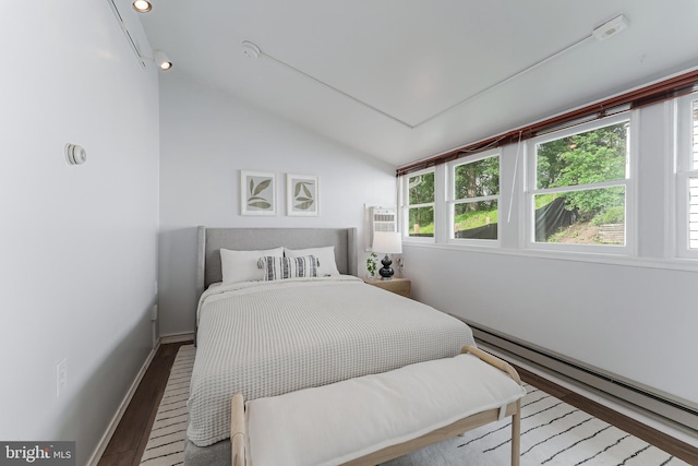 15415 Michigan Rd, Woodbridge, VA 22191 - bedroom featuring wood finished floors, lofted ceiling, baseboards, and a baseboard heating unit