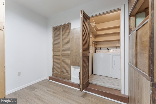 15415 Michigan Rd, Woodbridge, VA 22191 - laundry room featuring independent washer and dryer, wood finished floors, and baseboards