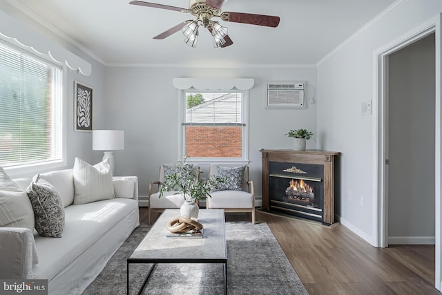 15415 Michigan Rd, Woodbridge, VA 22191 - living room featuring a ceiling fan, wood finished floors, a wall unit AC, ornamental molding, and a baseboard heating unit