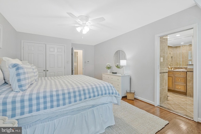 1153 Randolph Rd, Mclean, VA 22101 - bedroom with a closet, light wood finished floors, ceiling fan, and connected bathroom