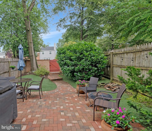 1153 Randolph Rd, Mclean, VA 22101 - fenced backyard featuring a gate and a patio